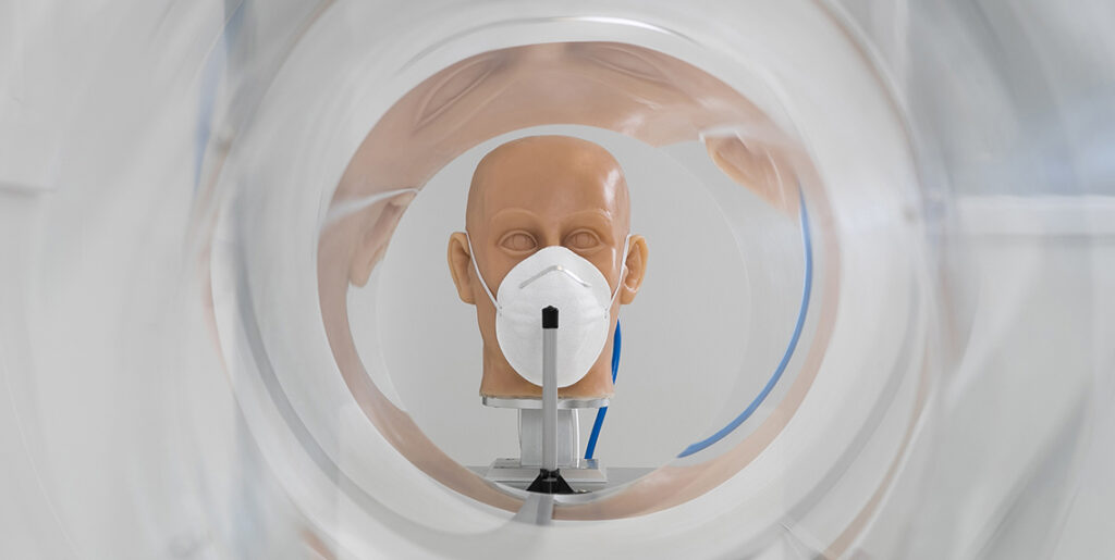 Head model with half face mask in tunnel